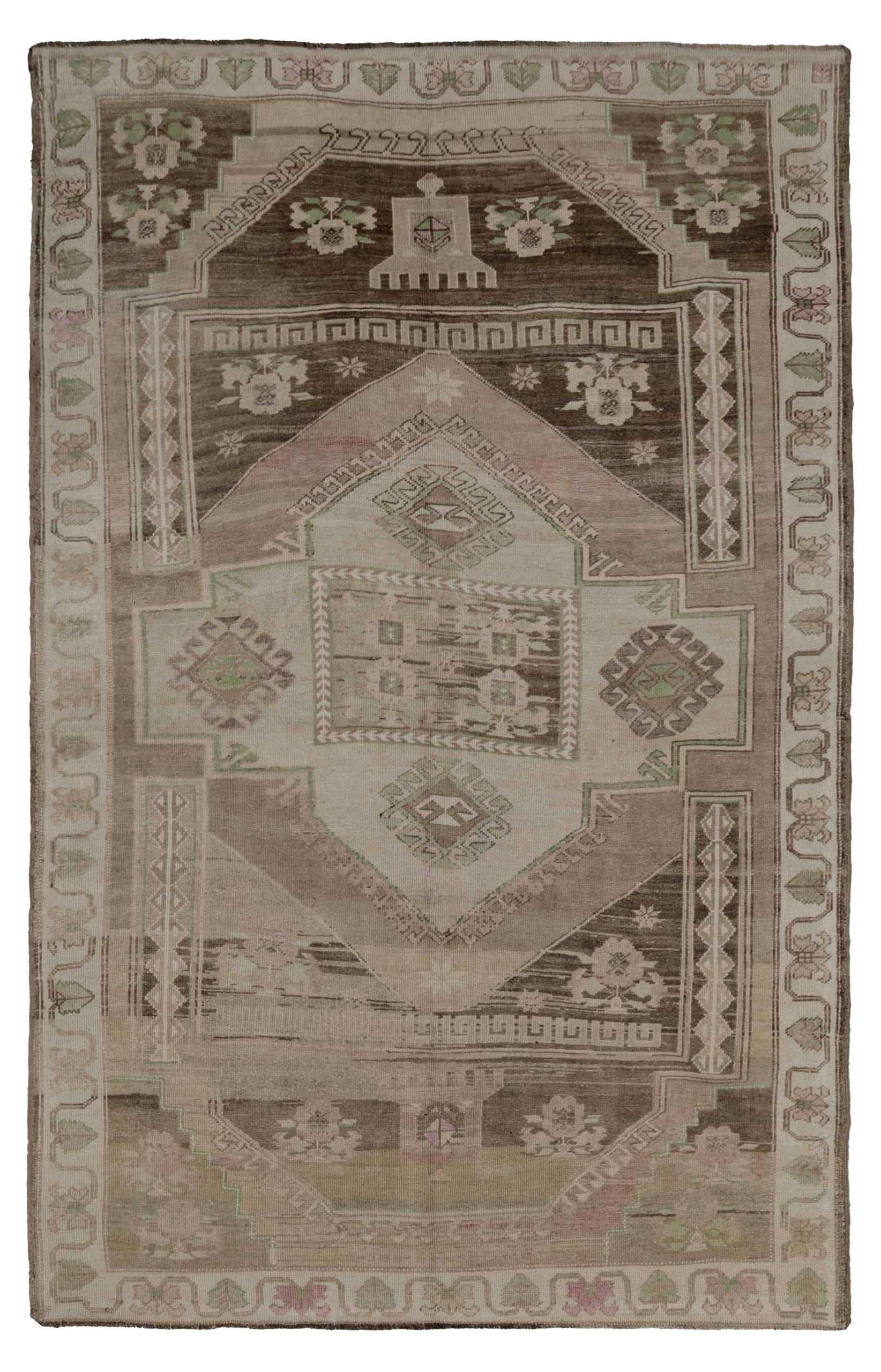 Turkey beige with brown, green and lavender accents tribal area antique rug with stacked geometric medallions, Greek key details and floral border motifs SKU 93018